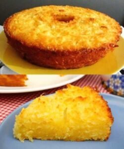 Bolo de coco simples dourado com uma fatia mostrando a massa úmida