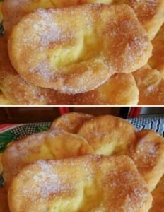 Um doce frito simples, sequinho e coberto com açúcar e canela